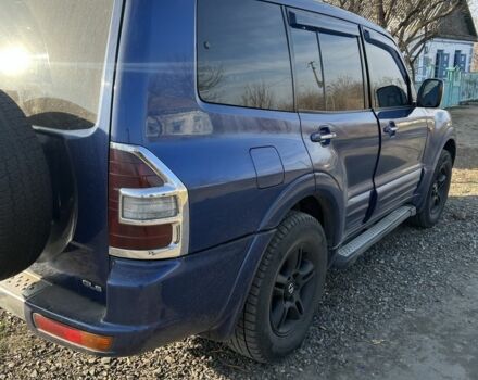 Синий Мицубиси Паджеро, объемом двигателя 3.5 л и пробегом 257 тыс. км за 6000 $, фото 4 на Automoto.ua