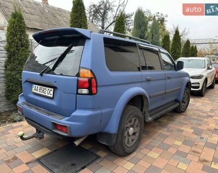 Синий Мицубиси Паджеро, объемом двигателя 3 л и пробегом 332 тыс. км за 6200 $, фото 3 на Automoto.ua