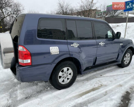 Синій Міцубісі Паджеро, об'ємом двигуна 3 л та пробігом 295 тис. км за 8500 $, фото 10 на Automoto.ua
