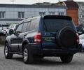 Синій Міцубісі Паджеро, об'ємом двигуна 3 л та пробігом 220 тис. км за 8450 $, фото 3 на Automoto.ua