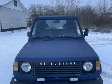 Синий Мицубиси Паджеро, объемом двигателя 2.48 л и пробегом 290 тыс. км за 3600 $, фото 1 на Automoto.ua