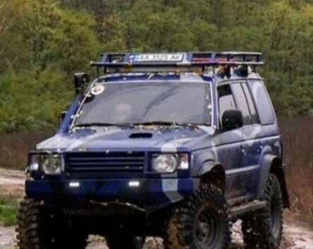 Синій Міцубісі Паджеро, об'ємом двигуна 2.48 л та пробігом 260 тис. км за 14777 $, фото 1 на Automoto.ua