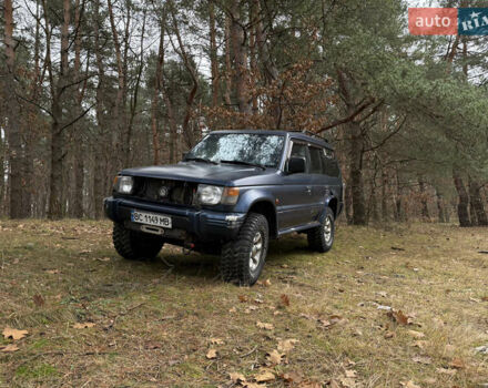 Синій Міцубісі Паджеро, об'ємом двигуна 3.5 л та пробігом 305 тис. км за 5300 $, фото 1 на Automoto.ua