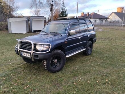 Синій Міцубісі Паджеро, об'ємом двигуна 3 л та пробігом 345 тис. км за 9900 $, фото 1 на Automoto.ua