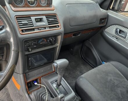 Зелений Міцубісі Паджеро, об'ємом двигуна 3 л та пробігом 280 тис. км за 5500 $, фото 6 на Automoto.ua