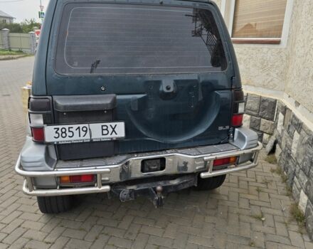 Зелений Міцубісі Паджеро, об'ємом двигуна 3 л та пробігом 280 тис. км за 5500 $, фото 2 на Automoto.ua