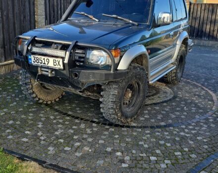 Зелений Міцубісі Паджеро, об'ємом двигуна 3 л та пробігом 280 тис. км за 5500 $, фото 9 на Automoto.ua