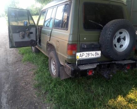 Зеленый Мицубиси Паджеро, объемом двигателя 2.5 л и пробегом 350 тыс. км за 210000 $, фото 3 на Automoto.ua