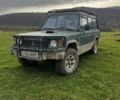 Зеленый Мицубиси Паджеро, объемом двигателя 2.5 л и пробегом 350 тыс. км за 3900 $, фото 1 на Automoto.ua