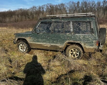 Зеленый Мицубиси Паджеро, объемом двигателя 2.5 л и пробегом 350 тыс. км за 3900 $, фото 4 на Automoto.ua