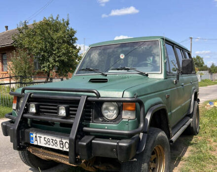 Зелений Міцубісі Паджеро, об'ємом двигуна 2.35 л та пробігом 300 тис. км за 4800 $, фото 1 на Automoto.ua
