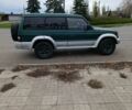 Зеленый Мицубиси Паджеро, объемом двигателя 2.5 л и пробегом 403 тыс. км за 5000 $, фото 2 на Automoto.ua
