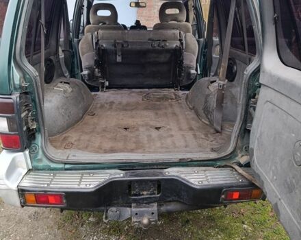 Зеленый Мицубиси Паджеро, объемом двигателя 2.5 л и пробегом 403 тыс. км за 5000 $, фото 6 на Automoto.ua