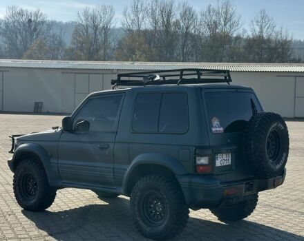 Зеленый Мицубиси Паджеро, объемом двигателя 2.5 л и пробегом 300 тыс. км за 7750 $, фото 2 на Automoto.ua