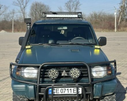 Зеленый Мицубиси Паджеро, объемом двигателя 2.5 л и пробегом 300 тыс. км за 7750 $, фото 1 на Automoto.ua