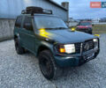 Зеленый Мицубиси Паджеро, объемом двигателя 2.5 л и пробегом 400 тыс. км за 7400 $, фото 1 на Automoto.ua