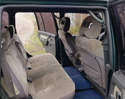 Зеленый Мицубиси Паджеро, объемом двигателя 2.5 л и пробегом 403 тыс. км за 5000 $, фото 5 на Automoto.ua