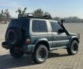 Зеленый Мицубиси Паджеро, объемом двигателя 2.5 л и пробегом 300 тыс. км за 7750 $, фото 3 на Automoto.ua