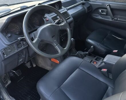 Зеленый Мицубиси Паджеро, объемом двигателя 2.5 л и пробегом 300 тыс. км за 7750 $, фото 6 на Automoto.ua