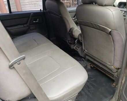 Зеленый Мицубиси Паджеро, объемом двигателя 2.8 л и пробегом 350 тыс. км за 5000 $, фото 5 на Automoto.ua