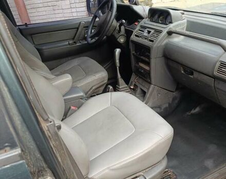 Зеленый Мицубиси Паджеро, объемом двигателя 2.8 л и пробегом 350 тыс. км за 5000 $, фото 2 на Automoto.ua