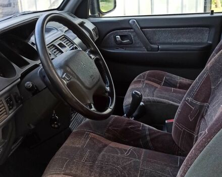 Зеленый Мицубиси Паджеро, объемом двигателя 2.8 л и пробегом 360 тыс. км за 5700 $, фото 9 на Automoto.ua