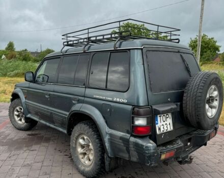 Зелений Міцубісі Паджеро, об'ємом двигуна 2.8 л та пробігом 330 тис. км за 3599 $, фото 12 на Automoto.ua