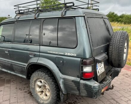 Зелений Міцубісі Паджеро, об'ємом двигуна 2.8 л та пробігом 330 тис. км за 3599 $, фото 11 на Automoto.ua