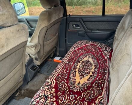 Зелений Міцубісі Паджеро, об'ємом двигуна 2.8 л та пробігом 330 тис. км за 3599 $, фото 15 на Automoto.ua