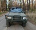 Зеленый Мицубиси Паджеро, объемом двигателя 3 л и пробегом 410 тыс. км за 2100 $, фото 1 на Automoto.ua