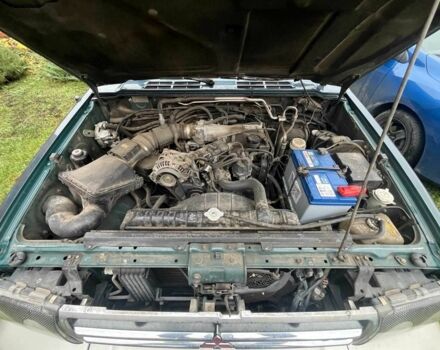 Зелений Міцубісі Паджеро, об'ємом двигуна 3 л та пробігом 197 тис. км за 5500 $, фото 14 на Automoto.ua