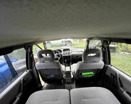 Зелений Міцубісі Паджеро, об'ємом двигуна 3 л та пробігом 197 тис. км за 5500 $, фото 6 на Automoto.ua