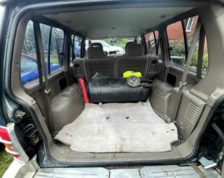 Зелений Міцубісі Паджеро, об'ємом двигуна 3 л та пробігом 197 тис. км за 5500 $, фото 5 на Automoto.ua