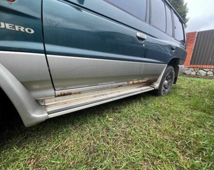 Зелений Міцубісі Паджеро, об'ємом двигуна 3 л та пробігом 197 тис. км за 5500 $, фото 12 на Automoto.ua