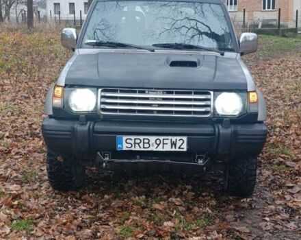 Зелений Міцубісі Паджеро, об'ємом двигуна 2 л та пробігом 350 тис. км за 3500 $, фото 12 на Automoto.ua