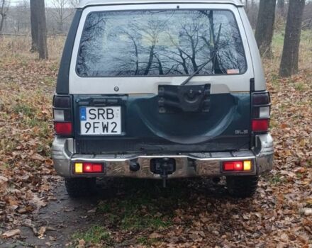 Зелений Міцубісі Паджеро, об'ємом двигуна 2 л та пробігом 350 тис. км за 3500 $, фото 15 на Automoto.ua