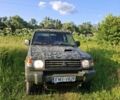 Зеленый Мицубиси Паджеро, объемом двигателя 2.5 л и пробегом 344 тыс. км за 3300 $, фото 1 на Automoto.ua