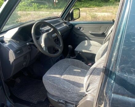 Зелений Міцубісі Паджеро, об'ємом двигуна 2.5 л та пробігом 400 тис. км за 3000 $, фото 4 на Automoto.ua