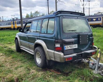 Зелений Міцубісі Паджеро, об'ємом двигуна 3 л та пробігом 310 тис. км за 6900 $, фото 10 на Automoto.ua