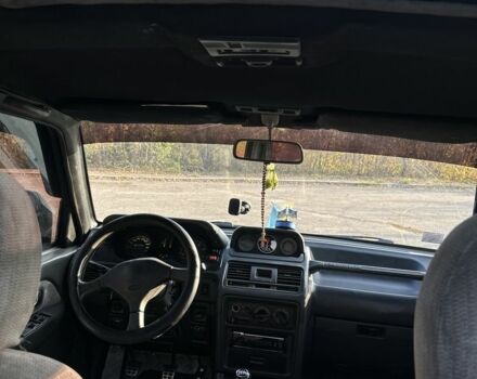 Зелений Міцубісі Паджеро, об'ємом двигуна 2.5 л та пробігом 350 тис. км за 3100 $, фото 9 на Automoto.ua