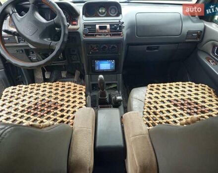 Зеленый Мицубиси Паджеро, объемом двигателя 3.5 л и пробегом 225 тыс. км за 6700 $, фото 4 на Automoto.ua