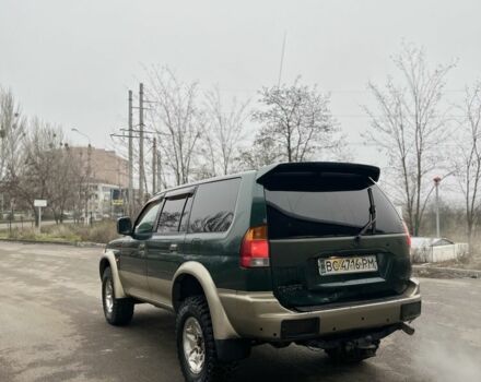 Зеленый Мицубиси Паджеро, объемом двигателя 3 л и пробегом 200 тыс. км за 3700 $, фото 3 на Automoto.ua