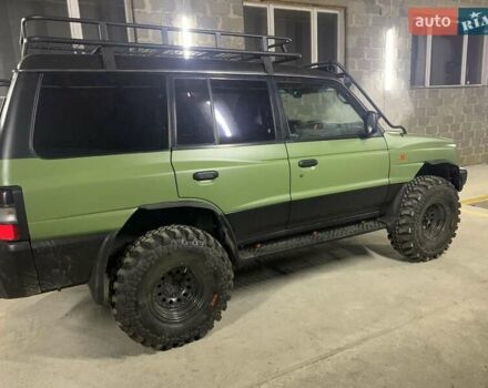 Зелений Міцубісі Паджеро, об'ємом двигуна 0 л та пробігом 225 тис. км за 11000 $, фото 9 на Automoto.ua