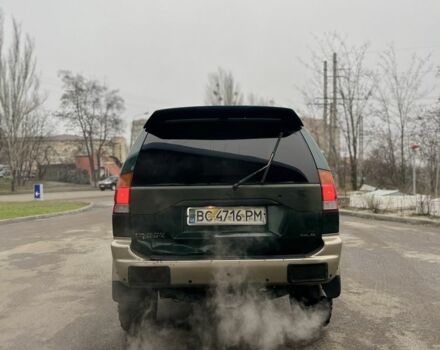 Зеленый Мицубиси Паджеро, объемом двигателя 3 л и пробегом 200 тыс. км за 3700 $, фото 4 на Automoto.ua