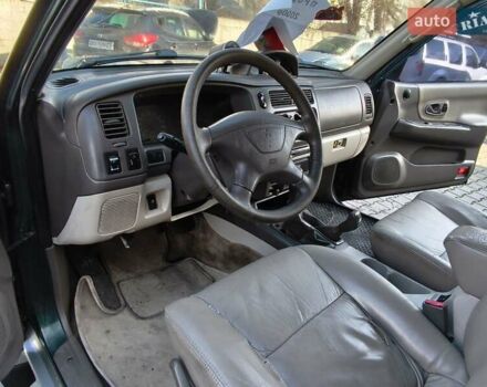 Зеленый Мицубиси Паджеро, объемом двигателя 2.5 л и пробегом 274 тыс. км за 6200 $, фото 4 на Automoto.ua