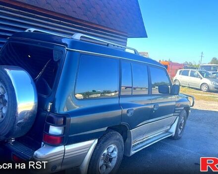 Зелений Міцубісі Паджеро, об'ємом двигуна 3.5 л та пробігом 220 тис. км за 4400 $, фото 2 на Automoto.ua