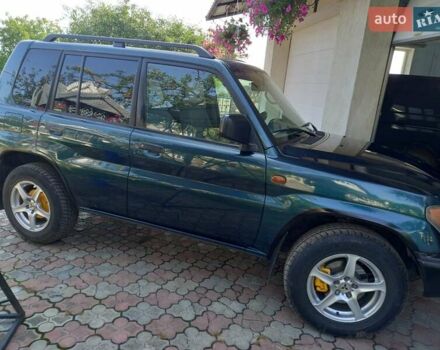 Зелений Міцубісі Паджеро, об'ємом двигуна 1.8 л та пробігом 205 тис. км за 5800 $, фото 14 на Automoto.ua