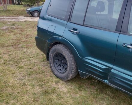 Зелений Міцубісі Паджеро, об'ємом двигуна 3 л та пробігом 249 тис. км за 3100 $, фото 5 на Automoto.ua