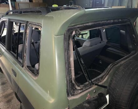 Зеленый Мицубиси Паджеро, объемом двигателя 1.8 л и пробегом 230 тыс. км за 1700 $, фото 2 на Automoto.ua