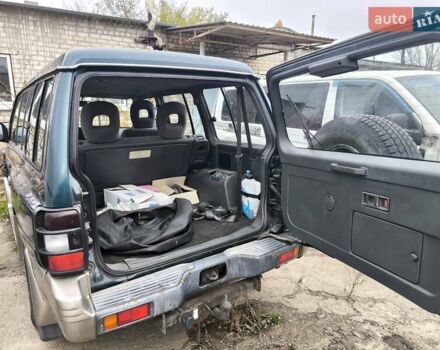 Зеленый Мицубиси Паджеро, объемом двигателя 2.5 л и пробегом 180 тыс. км за 6499 $, фото 11 на Automoto.ua